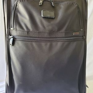 TUMI suitcase.